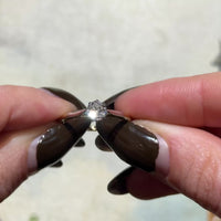 Diamond solitaire ring in platinum and gold