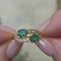 Vintage emerald and diamond crossover ring