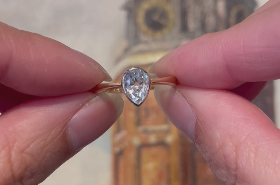 Old pear cut diamond solitaire ring