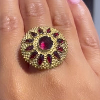 Garnet sun burst ring in 14 carat gold