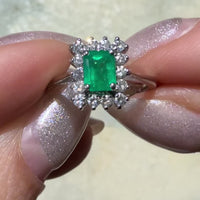 Emerald and diamond white gold ring