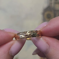 Vintage 18 carat wedding band with motif
