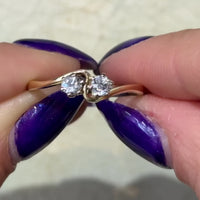 Diamond swirl ring in 14 carat gold