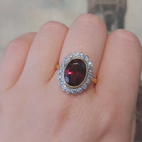 Vintage 18 carat garnet and diamond ring