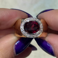 Garnet and diamond ring in 14 carat gold
