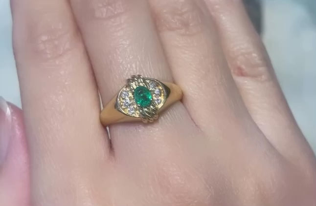 Emerald and diamond ring in 18 carat gold