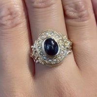 Cabochon granaat en parel ring in 14 karaats goud