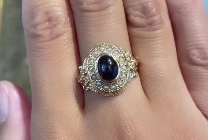 Cabochon granaat en parel ring in 14 karaats goud