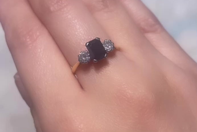 Sapphire and diamond three stone ring in 18 carat gold