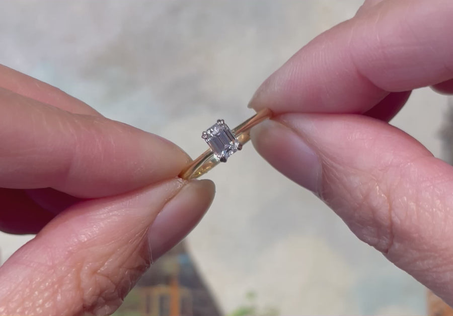 Emerald cut diamond solitaire ring