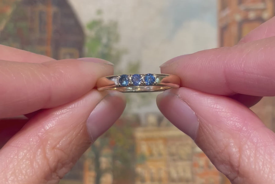 14 carat gold ring with sapphires