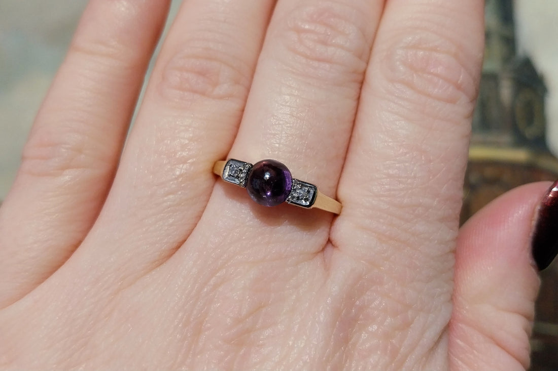 Cabochon amethyst ring with diamonds