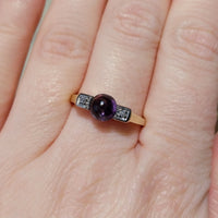 Cabochon amethyst ring with diamonds