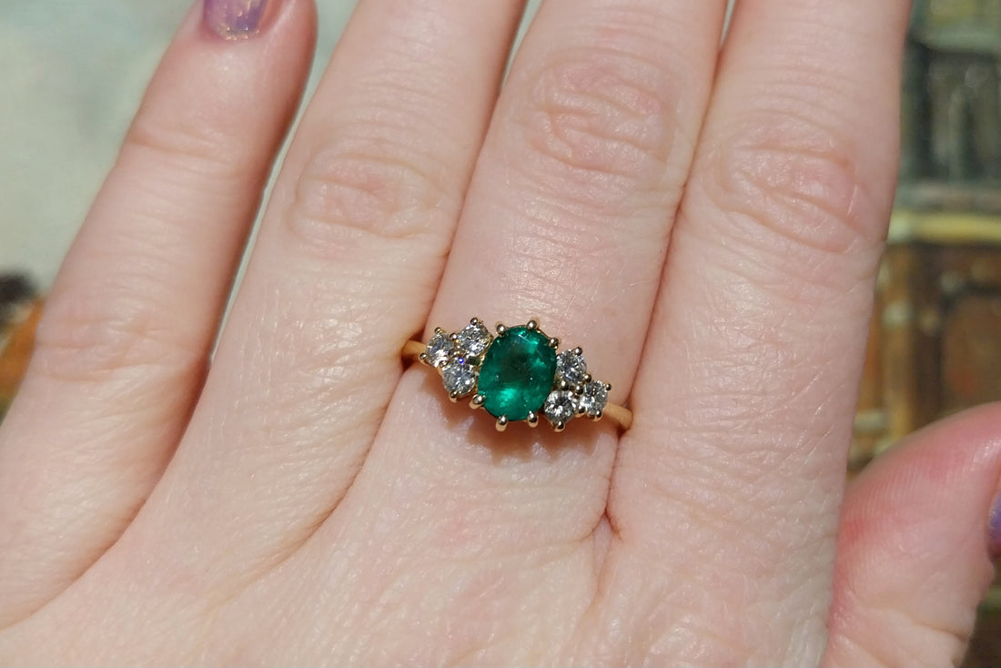 Emerald and diamond ring in 18 carat gold