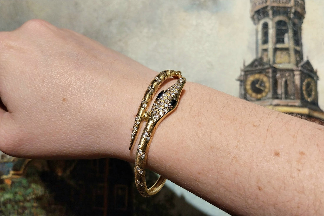 18 carat snake bracelet with diamonds and sapphires