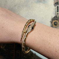18 carat snake bracelet with diamonds and sapphires