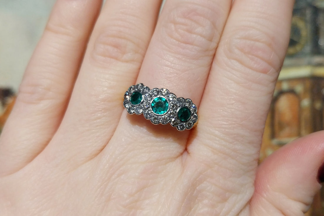 Vintage emerald and diamond triple cluster ring