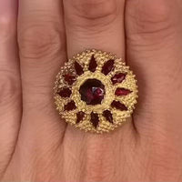 Garnet sun burst ring in 14 carat gold